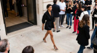 Ziwe Takes Fashion Month’s Thong Sandal Trend To The Courrèges Front Row In Orange Satin